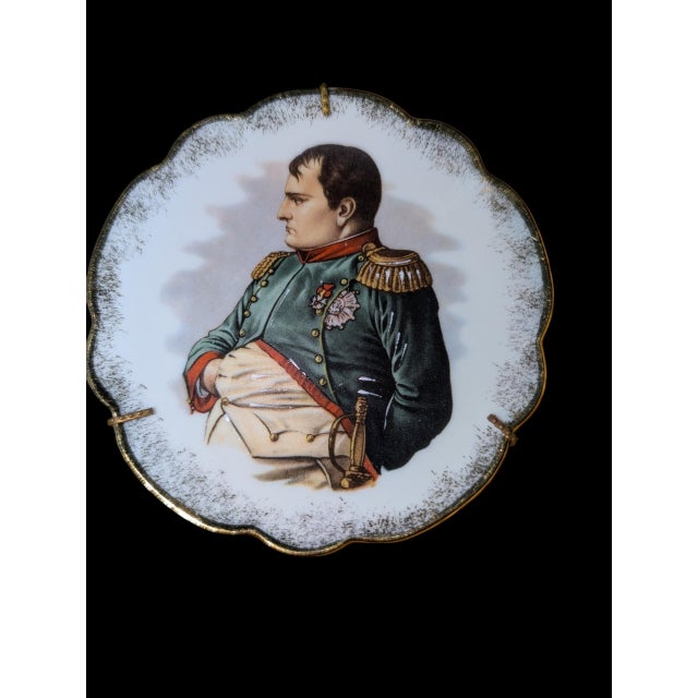 Add a touch of classical French grandeur to your collection with this exquisite vintage miniature porcelain cabinet plate...