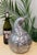 This is a unique, embossed metal squash form art nouveau style ice bucket wine cooler. Adorned with intricate motifs of...