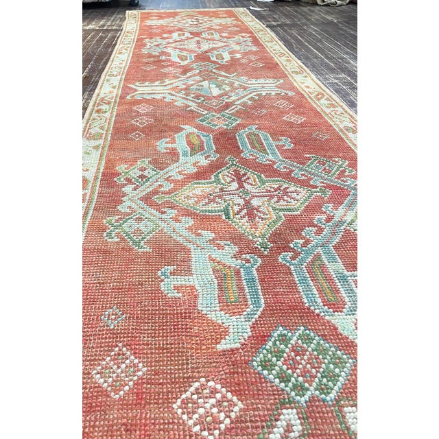 This striking Antique Turkish Oushak runner, woven around 1890, is an elegant example of late nineteenth-century Anatolian...