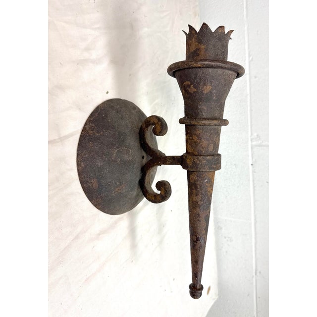 This antique 19th century hand wrought iron wall mount candle holder sconce is a stunning piece of Gothic decor. Made of...