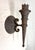 This antique 19th century hand wrought iron wall mount candle holder sconce is a stunning piece of Gothic decor. Made of...