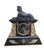 Large clock in the style of Egyptomania, in marble of different colors, decorated with stylized hieroglyphs, falcons and...