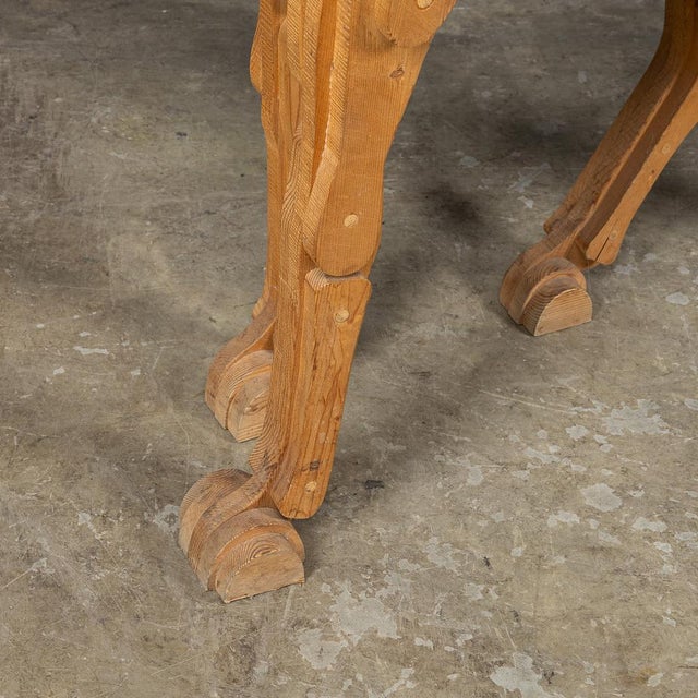 Vintage 20th Century Italian pine horse sculpture, created using the layered wood technique, where individual pieces are...