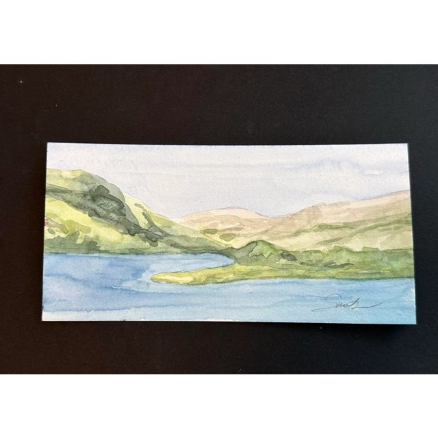 More green rolling hills and blue waters. Signed and ready to frame.