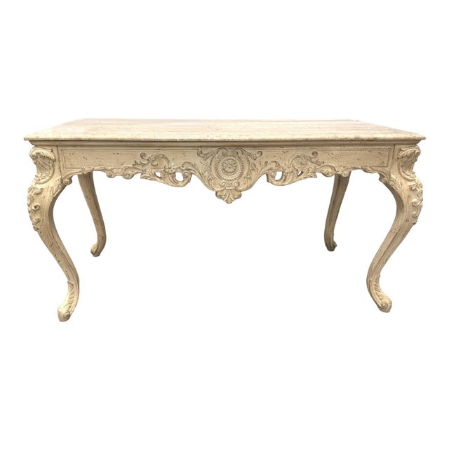 Vintage French Country Shabby Chic writing desk. Features richly carved details, cabriole legs, and a single drawer. The...