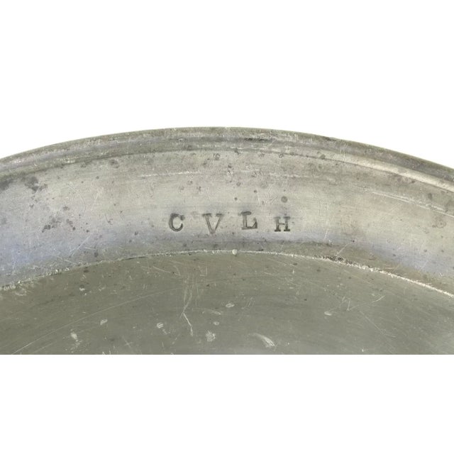 Large English pewter shallow bowl charger with owner's initials. 16 1/4"