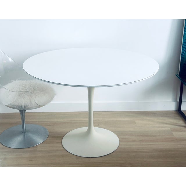 Authentic Tulip table designed by Eero Saarinen for Knoll in 1956, rare 1st edition Knoll bowtie label. Round 42" wood and...