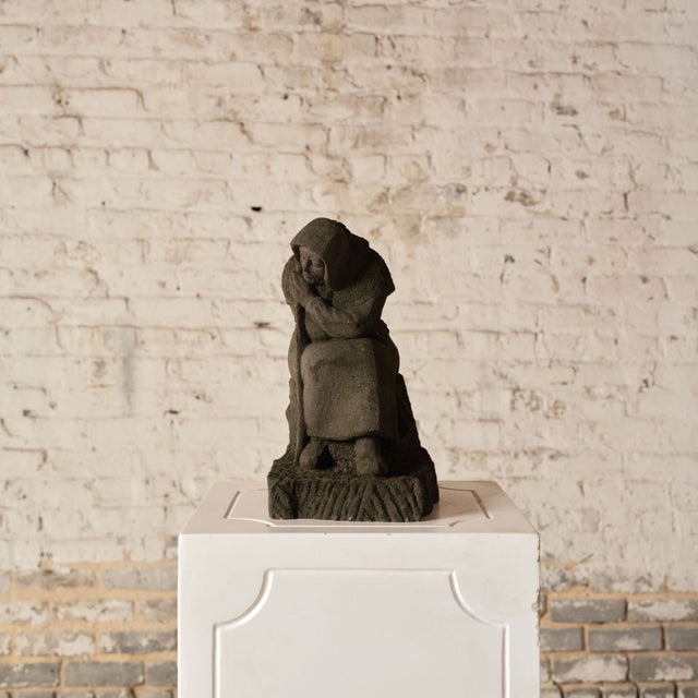 Add a powerful sculptural presence to your space with this early 20th century French stone figural sculpture, a...