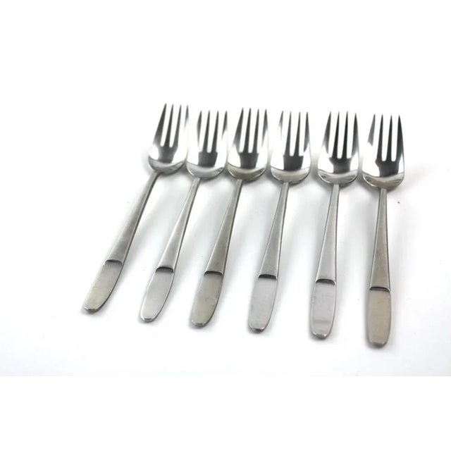 Stainless steel cutlery, consisting of 6 pieces L = 19.5cm, designed by Helmut Alder, 1957/58, produced by Amboss. All...