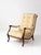 This vintage French Provincial lounge chair pairs a sweeping dark wood frame with pale cream floral damask upholstery....