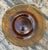 With its warm amber hue and softly translucent surface, this vintage glass serving tray brings mid-century character to a...