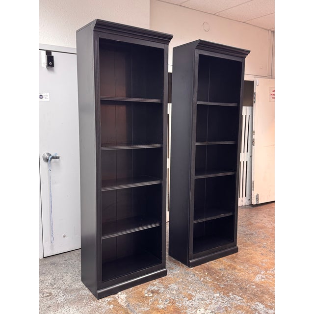Design Plus Gallery presents a Pair of Tuscan Flush Bookcases from Ballard Designs. This tall, rectangular bookcase is...