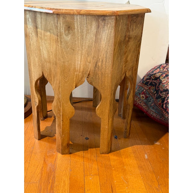 A neat Morracan inspired Octangular side table. Perfect in between a pair of chairs. Looks lovely from a 360 degree view...