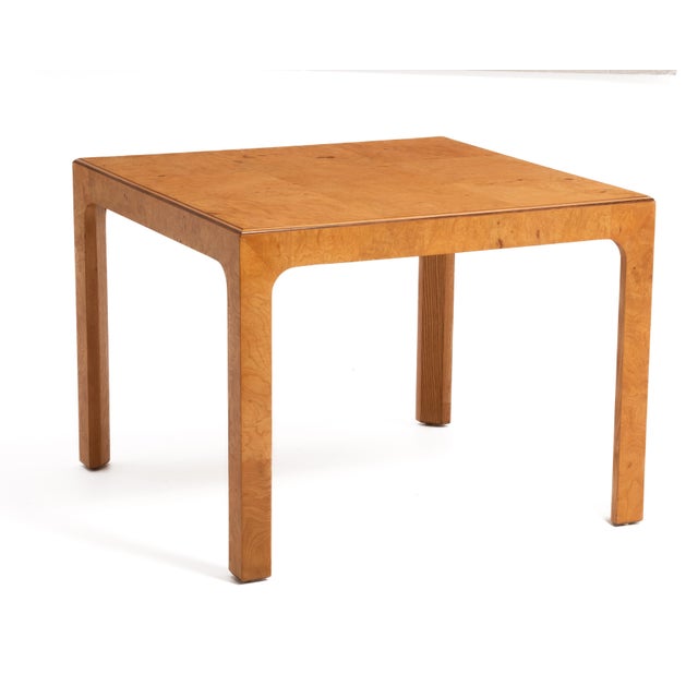 A square parsons style table from the Iconic Henredon "Scene Two" line. The top is a patchwork of nine square burl tiles....