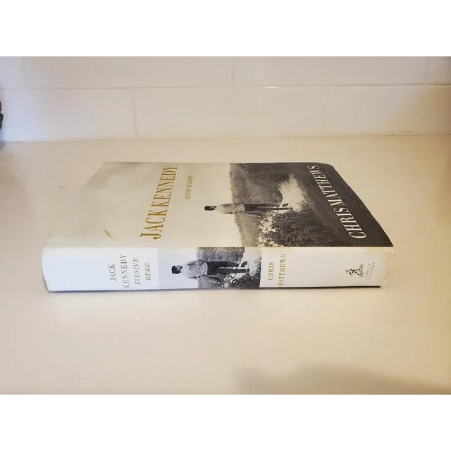 Jack Kennedy, Elusive Hero, hardcover biography by Chris Mathews. The author states that purpose of the book is to let...