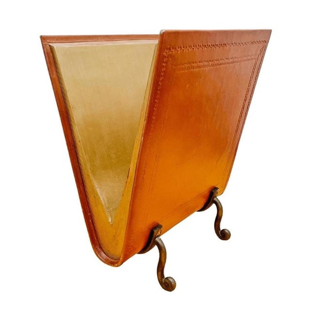 A wonderfully clever and decorative vintage Italian / Florentine leathercraft trompe l'oeil magazine rack designed in the...