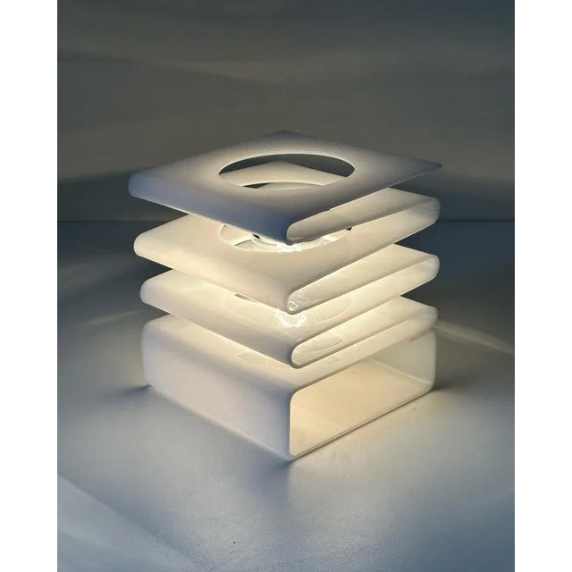 Rare folding lamp of white pespex of moin creations, it is a lamp creating a warm and pleasant atmosphere typical of the...