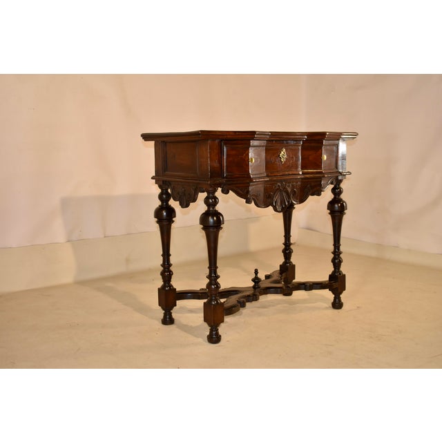 18th century PERIOD Rococo walnut console table. The top is made from walnut and is banded in satinwood, and has a central...
