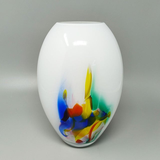 1970s Gorgeous vase handcrafted in Murano Glass. Made in Italy. The item is in excellent condition. Dimension: diameter...