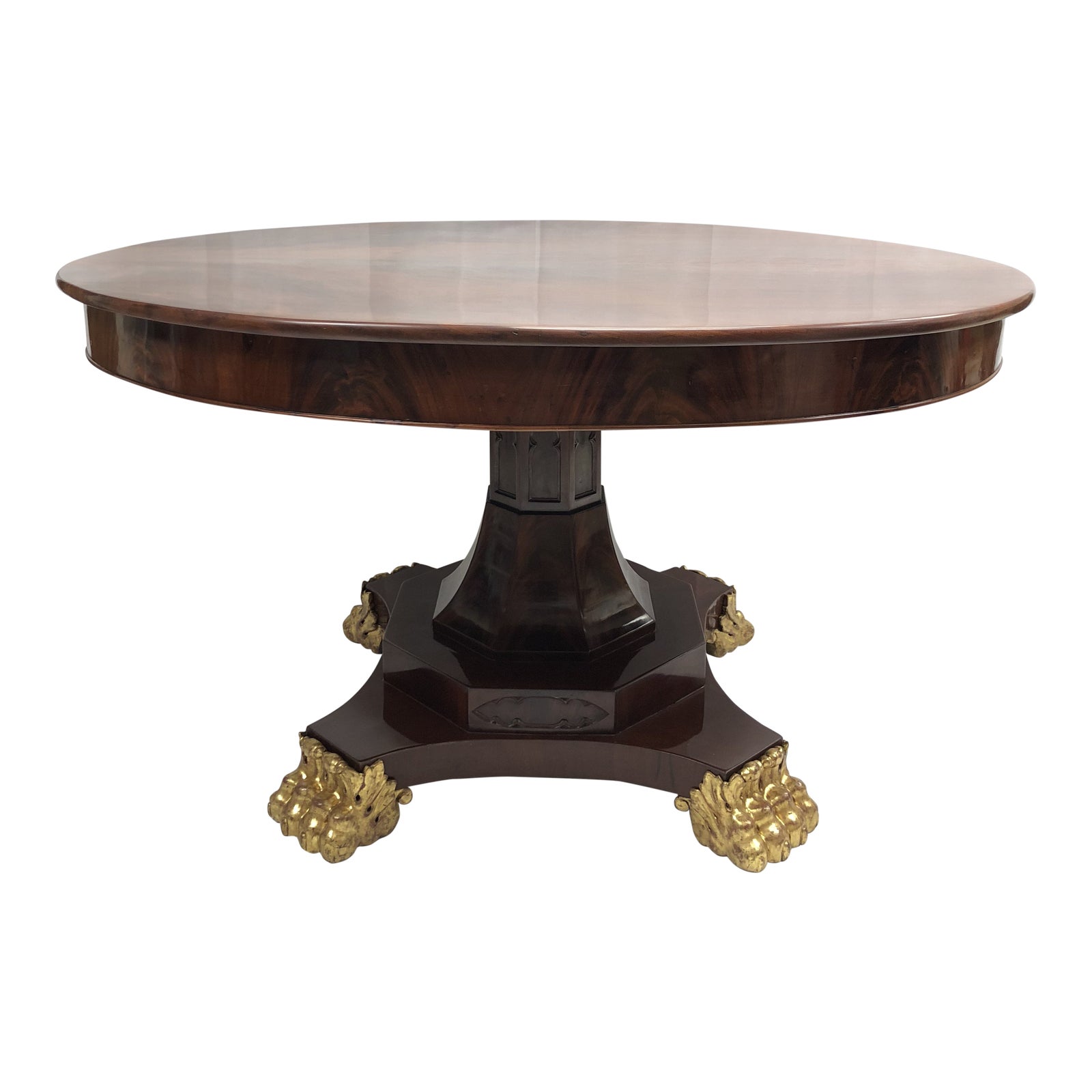 Round wood dining table with pedestal base