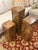 Design Plus Gallery presents a Set of Three Burl Wood Veneer Pedestal/Display Stands. The type of pedestal is attributed...