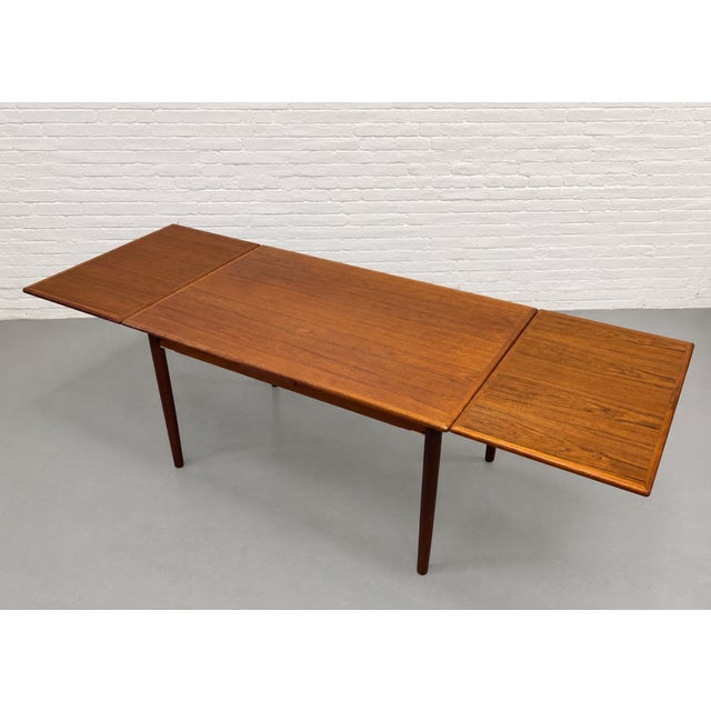 1960s Danish Mid Century Modern Teak Dining Table | Expandable Hidden Leaves, C. 1960’s For Sale - Image 5 of 10