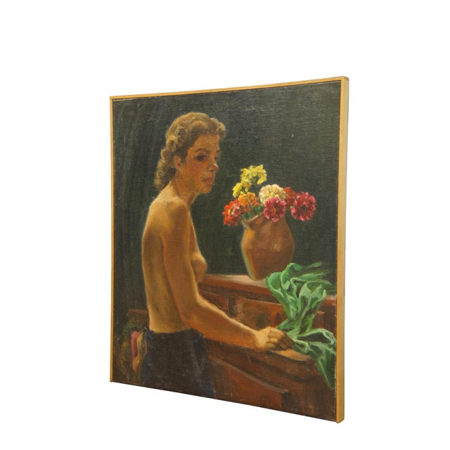 Mid century oil painting on canvas depicting a brown haired topless female figure pulling a green shirt off a wooden...