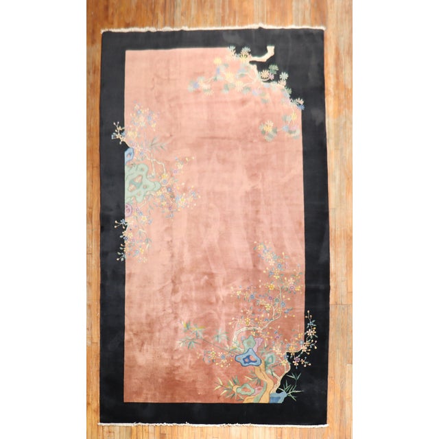 Enchanting floral design early 20th century Chinese Art Deco carpet in an odd size wide gallery room size format....
