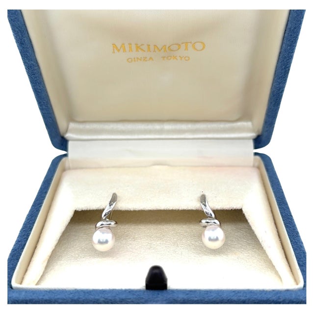 These classic Mikimoto earrings feature a signature twisted design. Each earring is set with a luminous 7.00 mm cultured...