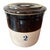 A handsome late 19th-century American stoneware storage crock retaining its original matching lid, decorated with a...