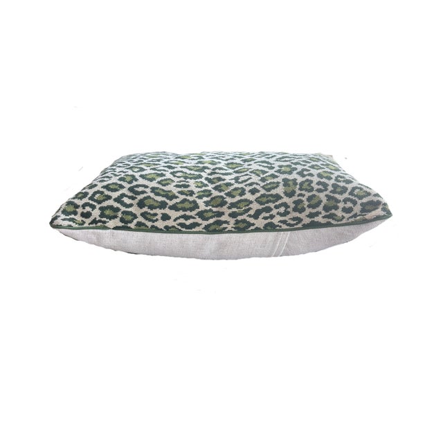 Bring a refined touch of pattern to any space with this handcrafted lumbar pillow. Featuring an abstract leopard-inspired...