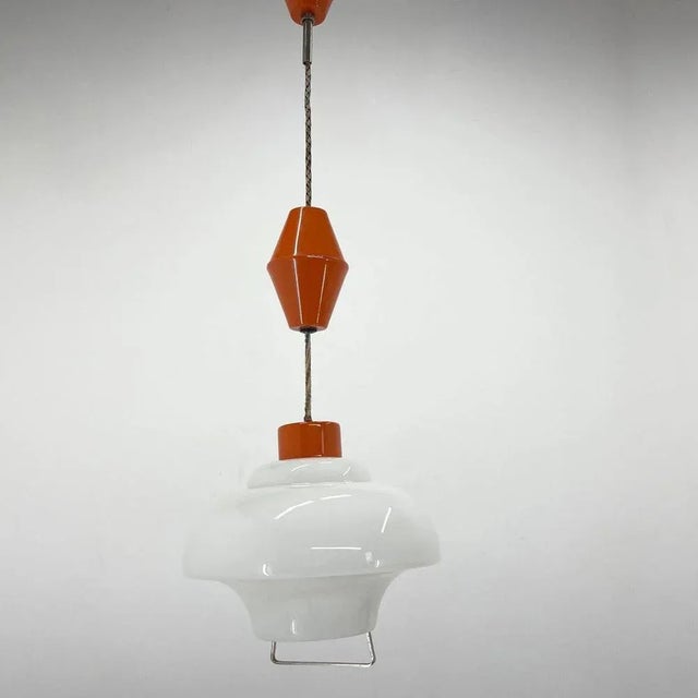 Pull-down pandant light can be stretched up to 93 cm of total hight. Very popular type of lighting in Czeechoslovakia in...