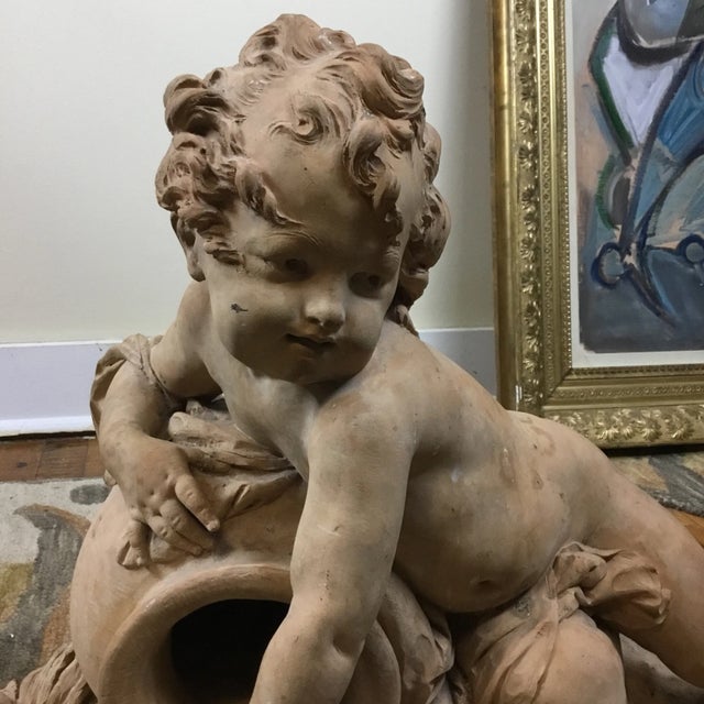 Terracotta Putti water bearer 19th century French c. 1860. High detail attributed to Albert Ernest Carrier Belleuse...