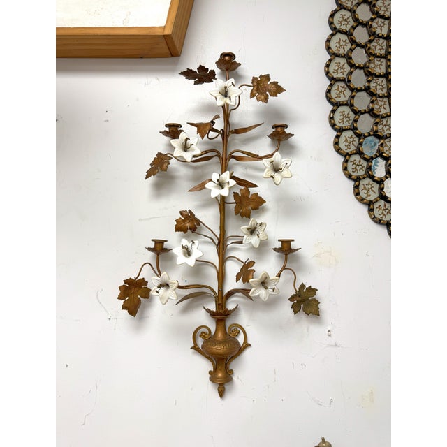 A Pair of French Gilt Metal and Opaline Glass Five-Light Floral Candle Sconces A pair of very decorative, authentic French...