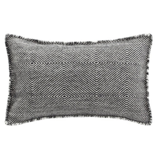 Two Pure Woolen Poufs and One lumbar pillow in perfect condition for sale. Custom filled with sustainable shredded latex....