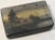 We are offering an antique black lacquer box from Russia with a hand painted landscape scene. It features a house along...