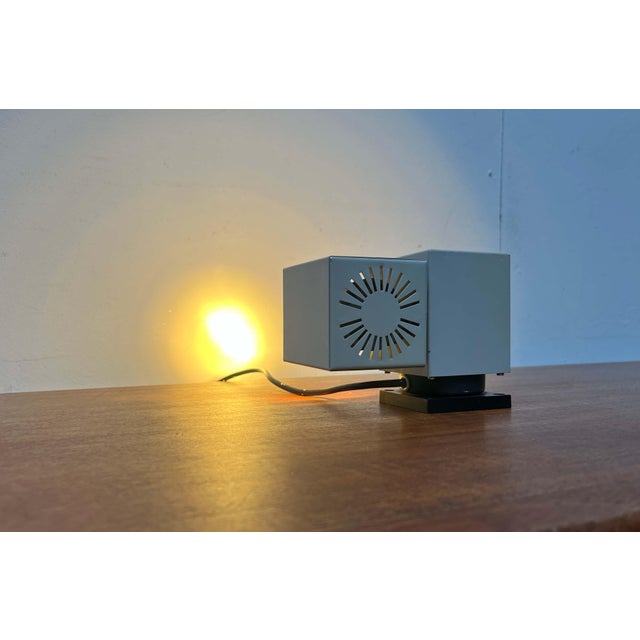 Mid-century modern wall/table lamp by kaiser leuchten. a minimalist design. Two cubes of identical dimensions are...