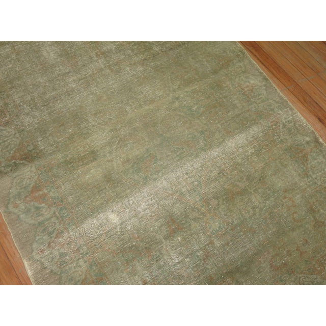 An early 20th-century Turkish distressed carpet. 4' x 6'1''
