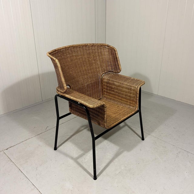 Nice rare easy chair by Wouter Fens for Gebroeders Jonker, Netherlands. Special shaped rattan seat and backrest, black...