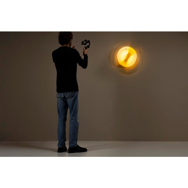 Some designs carry movement without ever shifting. These “Sierra” wall lights by Roberto Pamio for Leucos, produced in the...