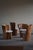 A truly unique dining set of 4 stump chairs, made in solid pine and reupholstered in bouclé wool. Hand carved in Sweden by...