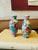 A beautiful pair of vintage miniature porcelain vases decorated in the exuberant Millefleurs, or “100 Flowers,” pattern....