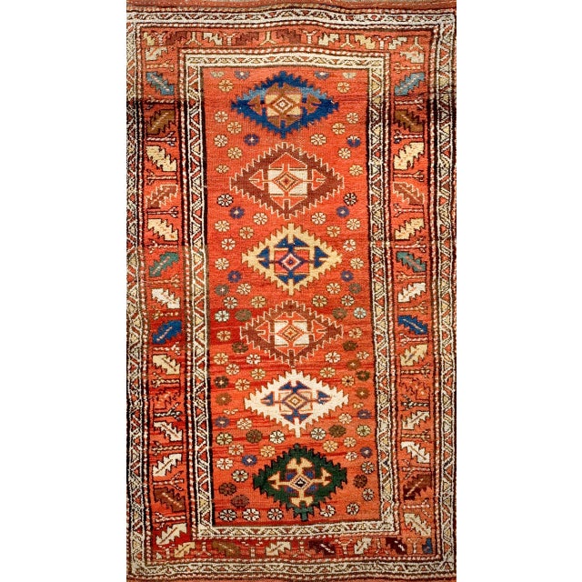 Antique Kurdish Iran 1900s Rug, Country of Origin: Iran Persia, Circa Date: 1900s. This exceptional piece of nomadic...