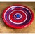 This vintage Raymor plate is a striking display of hand-applied concentric banding, with alternating rings of saturated...