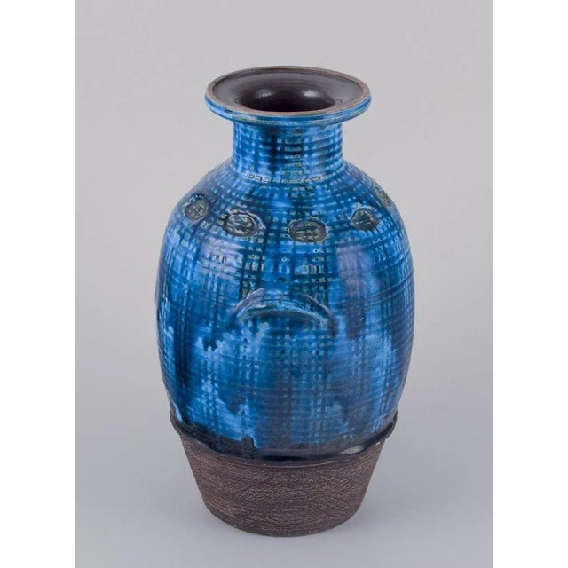 Aldo Londi for Bitossi. Vase in Rimini blue glazed ceramic with geometric patterns. Classic form with handles. 1960s....