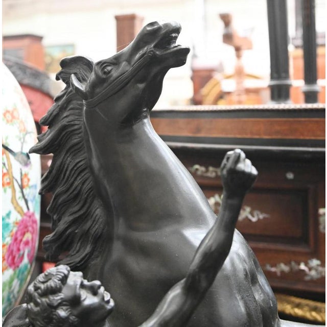A unique pair of antique bronze marley horses we date these to circa 1860 patina to the bronze is superb check out details...
