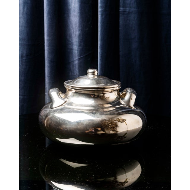 An exceptional and rare sculptural tureen crafted in .925 sterling silver by the prestigious Italian firm BVLGARI, circa...