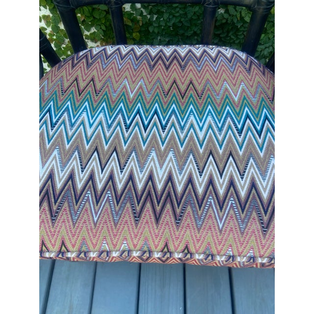 Comfortable and great style in this Chinoiserie faux bamboo and rattan armchair which is in a ever so slightly cerused...