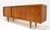 This is in great condition. A beautiful and functional sideboard or credenza made by H.P. Hansen, a premier Danish...