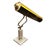 A vintage piano lamp featuring a classic elongated brass shade designed to provide even illumination for sheet music,...